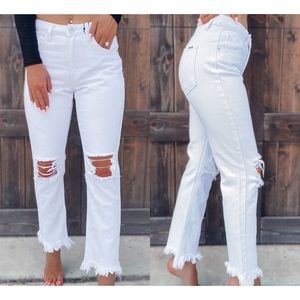 Distressed white crop jeans